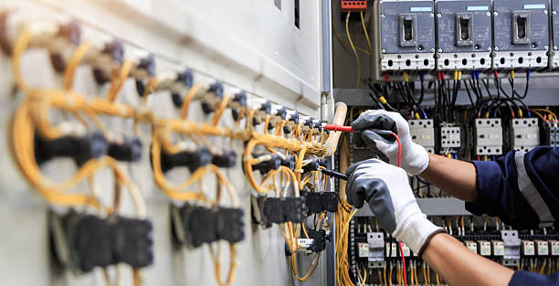 Professional Electrician technician working in Elsmere, DE